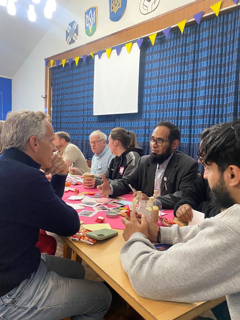 Cameron Ogden talking to Rochdale people at Let's Talk about our story September 2026